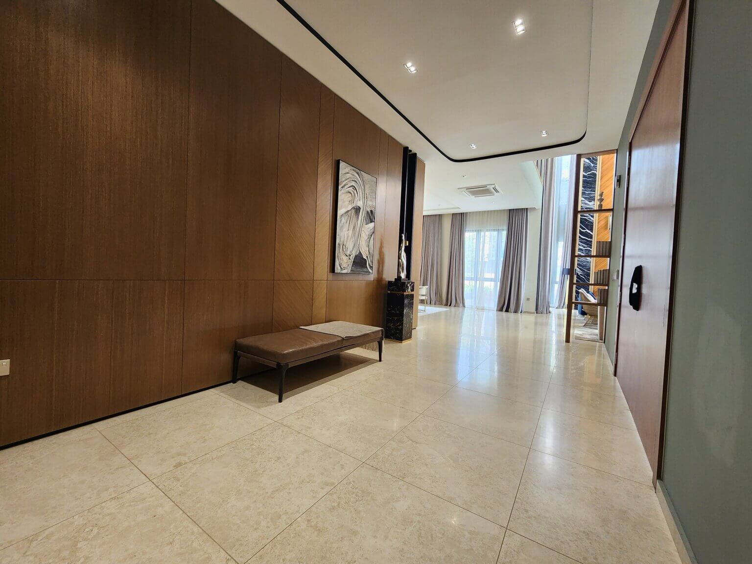 A welcoming grand entrance with premium marble finishes.